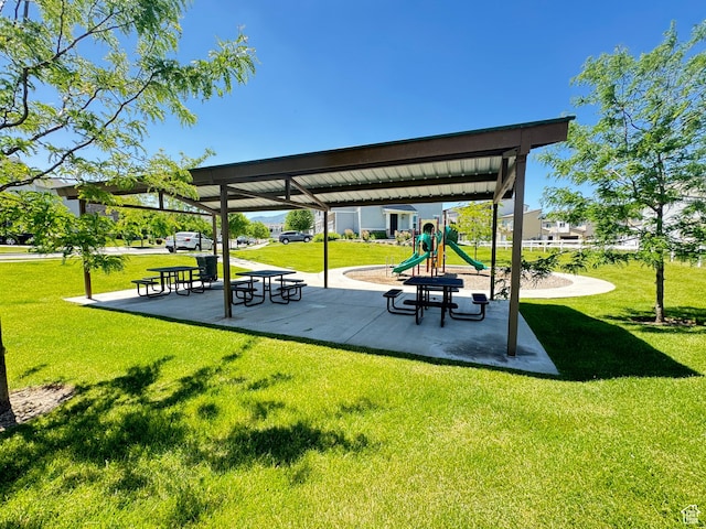 5923 W 8170 S Unit U102, West Jordan, UT 84081 - view of property's community featuring a lawn