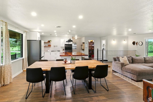 12800 N 1200 E, Cove, UT 84320 - dining space with wood finished floors and recessed lighting