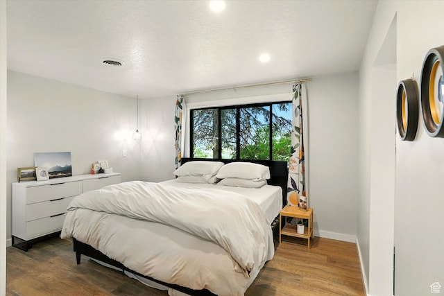 12800 N 1200 E, Cove, UT 84320 - bedroom with wood finished floors and recessed lighting