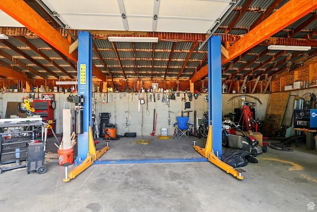 12800 N 1200 E, Cove, UT 84320 - garage featuring a workshop area