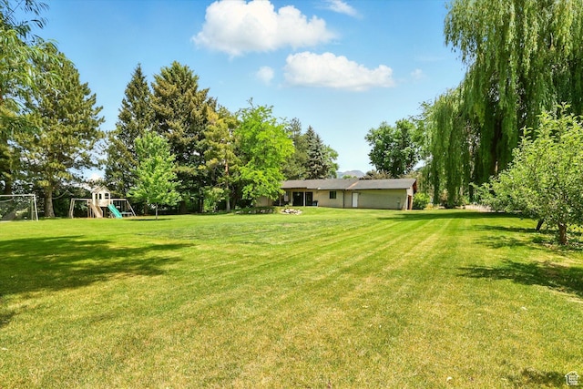 12800 N 1200 E, Cove, UT 84320 - view of grassy yard with a playground