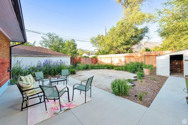 3022 S Jackson Ave E, Ogden, UT 84403 - fenced backyard with a patio