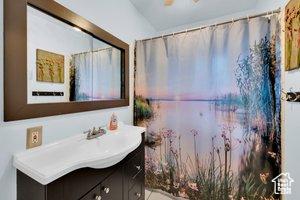 3022 S Jackson Ave E, Ogden, UT 84403 - full bathroom with vanity and tile patterned flooring