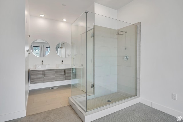 877 S 200 W Unit 212, Salt Lake City, UT 84101 - bathroom featuring a shower stall, double vanity, and recessed lighting