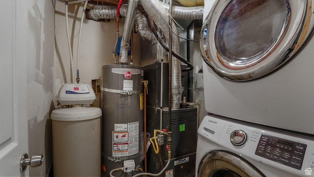 4111 S John Way W, West Valley City, UT 84120 - washroom featuring water heater and estacked washer and dryer
