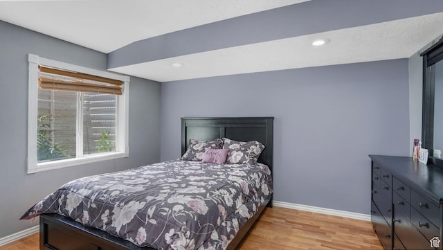 4111 S John Way W, West Valley City, UT 84120 - bedroom with light wood-style flooring and recessed lighting