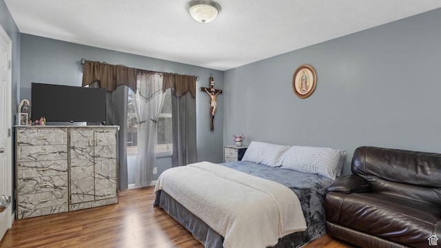 4111 S John Way W, West Valley City, UT 84120 - bedroom featuring wood finished floors