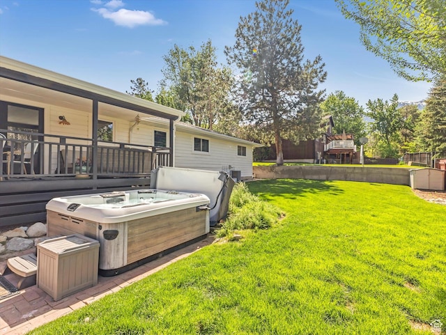 9714 S Buttonwood Dr E, Sandy, UT 84092 - view of grassy yard with a hot tub