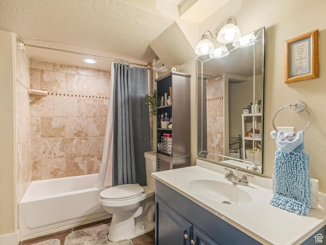 9714 S Buttonwood Dr E, Sandy, UT 84092 - bathroom featuring shower / bath combo with shower curtain, vanity, and a textured ceiling