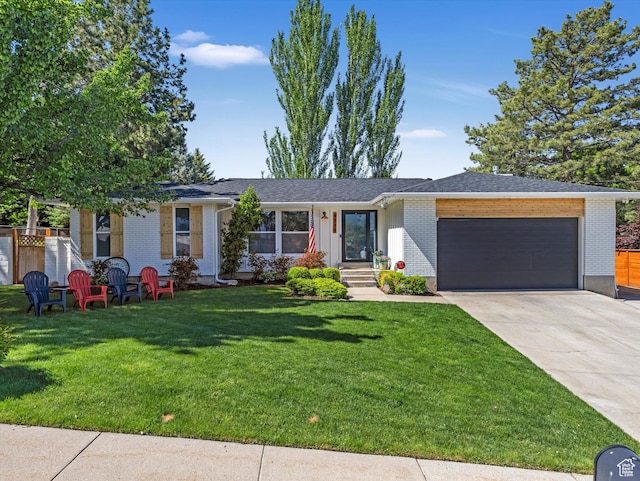 9714 S Buttonwood Dr E, Sandy, UT 84092 - ranch-style house with an attached garage, concrete driveway, and brick siding
