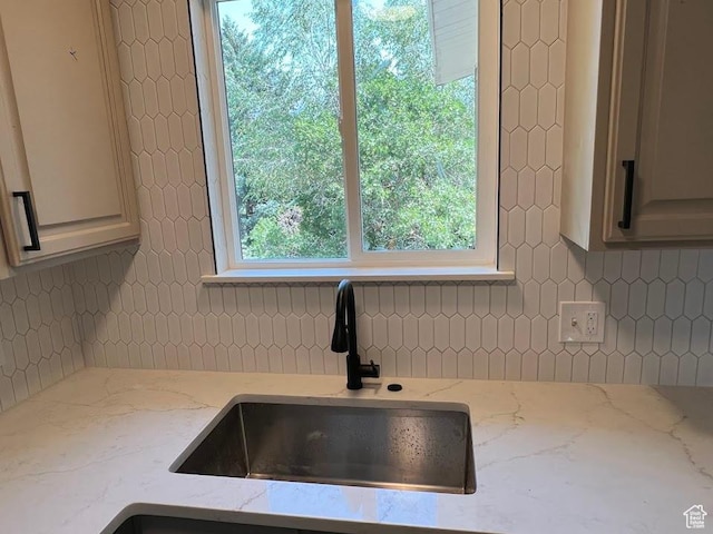 1569 E Boysenberry Cir S, Sandy, UT 84093 - kitchen with decorative backsplash and light stone countertops