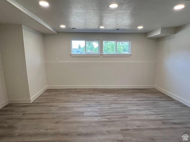 1569 E Boysenberry Cir S, Sandy, UT 84093 - basement featuring recessed lighting and wood finished floors