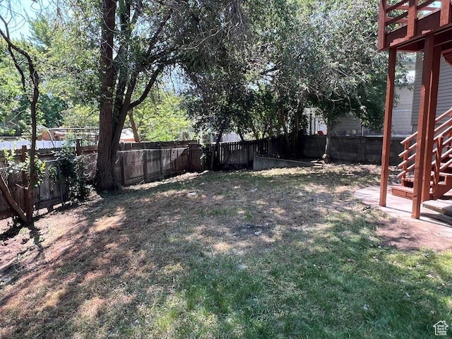 1569 E Boysenberry Cir S, Sandy, UT 84093 - fenced backyard featuring stairway
