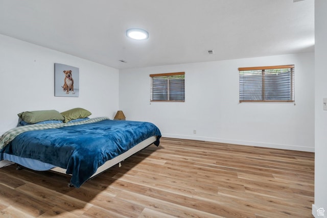 12012 S Hidden Valley Club Dr, Sandy, UT 84092 - bedroom featuring light wood-type flooring