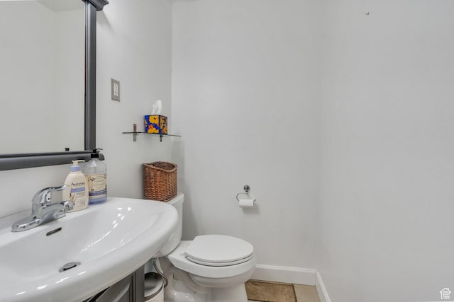 12012 S Hidden Valley Club Dr, Sandy, UT 84092 - half bathroom with a sink and tile patterned flooring