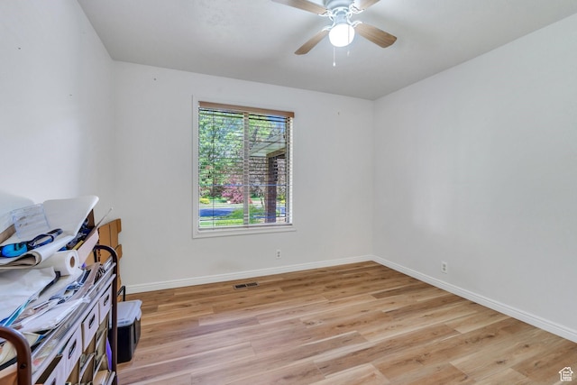 12012 S Hidden Valley Club Dr, Sandy, UT 84092 - empty room with light wood finished floors and a ceiling fan