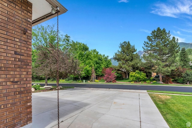 12012 S Hidden Valley Club Dr, Sandy, UT 84092 - view of patio with a mountain view