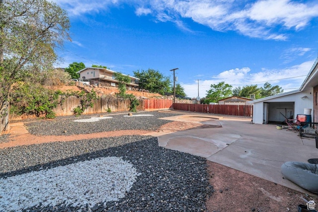 726 N Valley View Dr E, St George, UT 84770 - fenced backyard featuring a patio