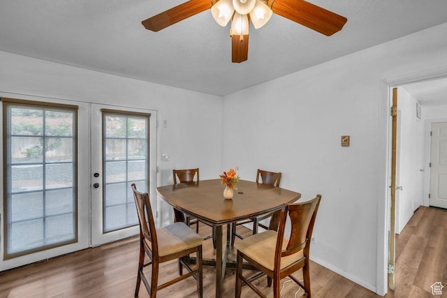 726 N Valley View Dr E, St George, UT 84770 - dining space featuring french doors, wood finished floors, and a ceiling fan