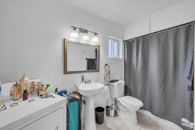 726 N Valley View Dr E, St George, UT 84770 - bathroom with tile patterned floors, washer / clothes dryer, and curtained shower