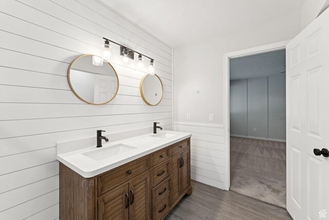 1212 Pinehurst Cir, Farmington, UT 84025 - full bathroom featuring wooden walls, double vanity, and wood finished floors
