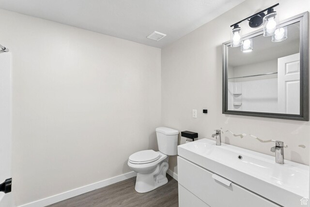 1212 Pinehurst Cir, Farmington, UT 84025 - bathroom featuring wood finished floors and vanity