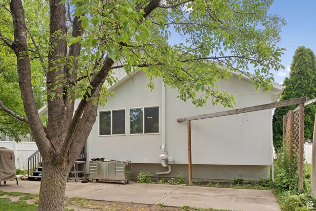 1212 Pinehurst Cir, Farmington, UT 84025 - view of property exterior with a patio area