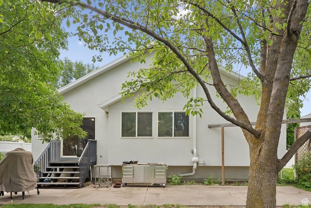 1212 Pinehurst Cir, Farmington, UT 84025 - back of property with stucco siding and a patio area