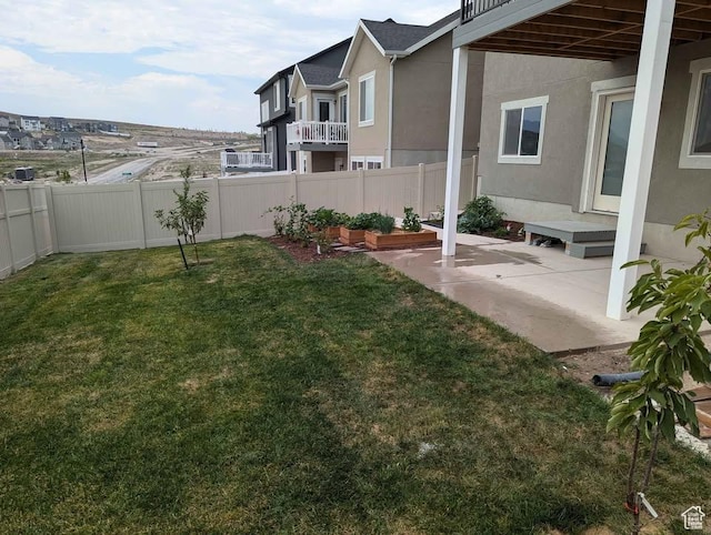 922 Olson Dr N, Saratoga Springs, UT 84045 - fenced backyard with a patio
