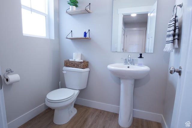 922 Olson Dr N, Saratoga Springs, UT 84045 - half bath featuring toilet and wood finished floors