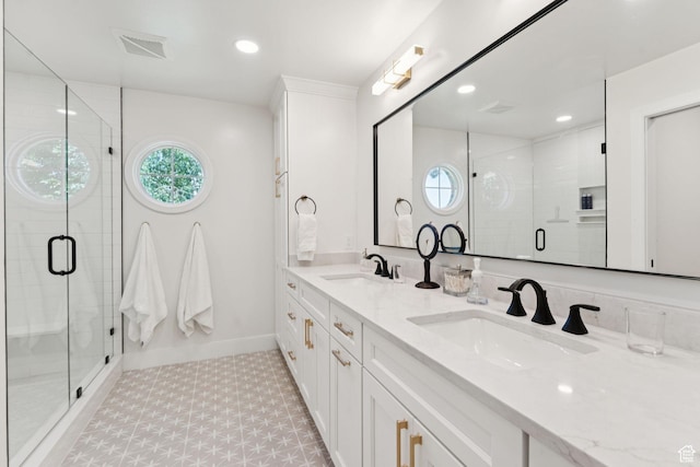 1537 N Sweetwater Ln, Farmington, UT 84025 - bathroom featuring plenty of natural light, double vanity, a stall shower, and recessed lighting