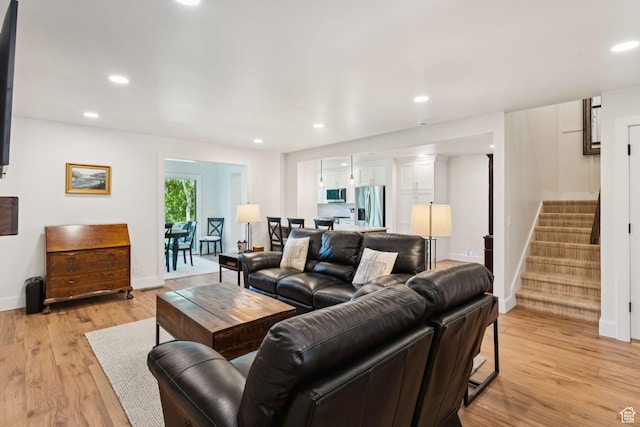 1537 N Sweetwater Ln, Farmington, UT 84025 - living room with stairway, light wood finished floors, and recessed lighting