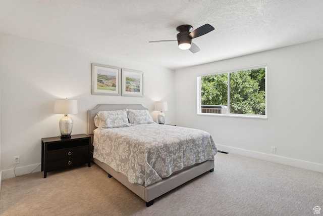 1537 N Sweetwater Ln, Farmington, UT 84025 - bedroom with light colored carpet, a ceiling fan, and a textured ceiling