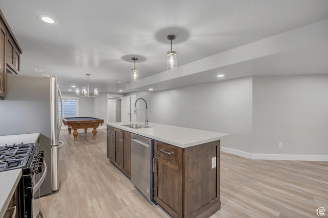 2508 E Lone Hill Dr, Draper Ut Cnty, UT 84020 - kitchen with stainless steel appliances, light wood-style flooring, recessed lighting, light countertops, and an island with sink