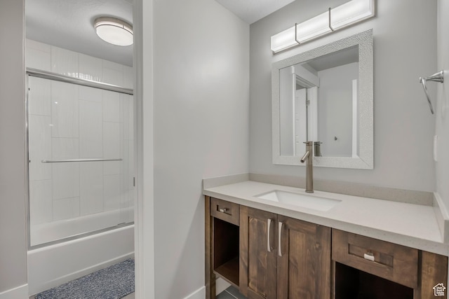 2508 E Lone Hill Dr, Draper Ut Cnty, UT 84020 - bathroom with vanity and bath / shower combo with glass door