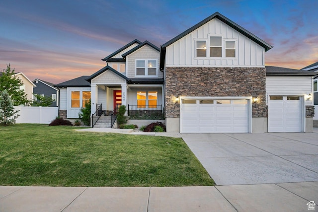 2508 E Lone Hill Dr, Draper Ut Cnty, UT 84020 - view of front of property featuring stone siding, board and batten siding, concrete driveway, and a porch