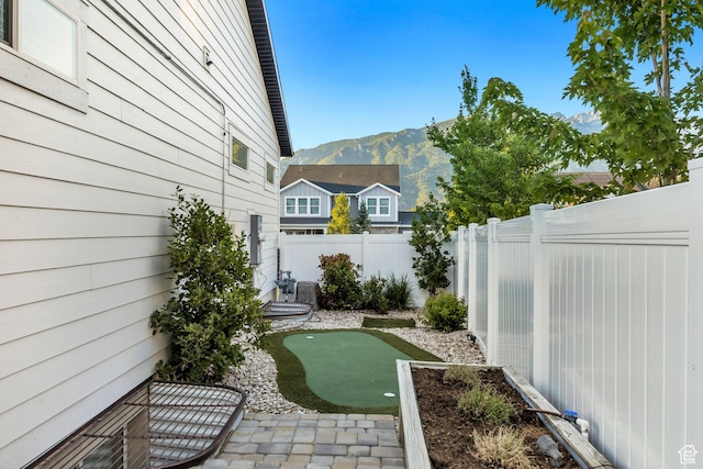 2508 E Lone Hill Dr, Draper Ut Cnty, UT 84020 - view of yard with an area to practice putting and a mountain view