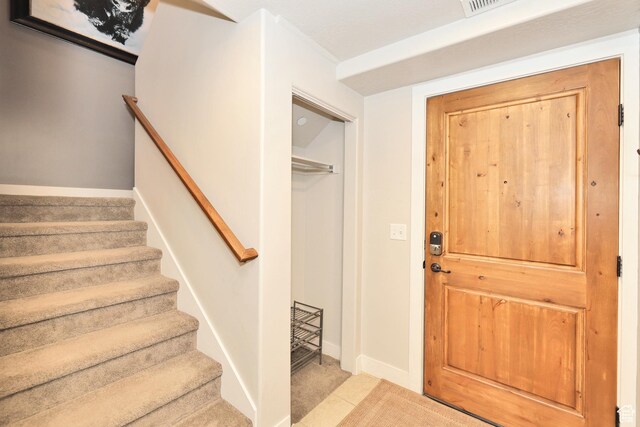 6169 E Park Ln S Unit 30, Park City, UT 84098 - foyer entrance with stairway and baseboards