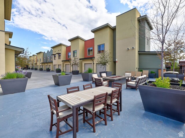 6169 E Park Ln S Unit 30, Park City, UT 84098 - view of patio / terrace with a residential view and a fire pit