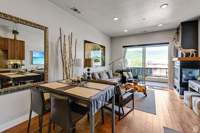 6169 E Park Ln S Unit 30, Park City, UT 84098 - dining room featuring light wood-type flooring, recessed lighting, and a textured ceiling