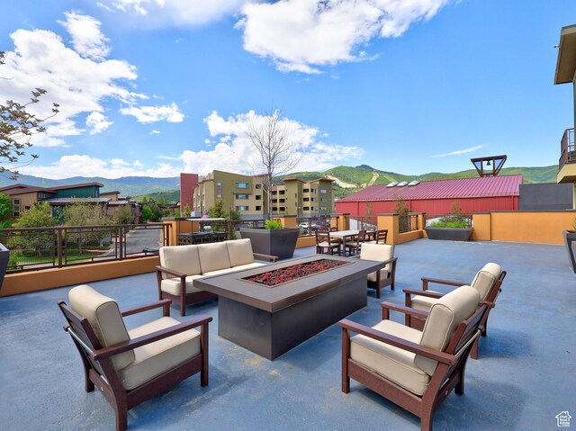 6169 E Park Ln S Unit 30, Park City, UT 84098 - view of patio featuring a mountain view and an outdoor living space with a fire pit