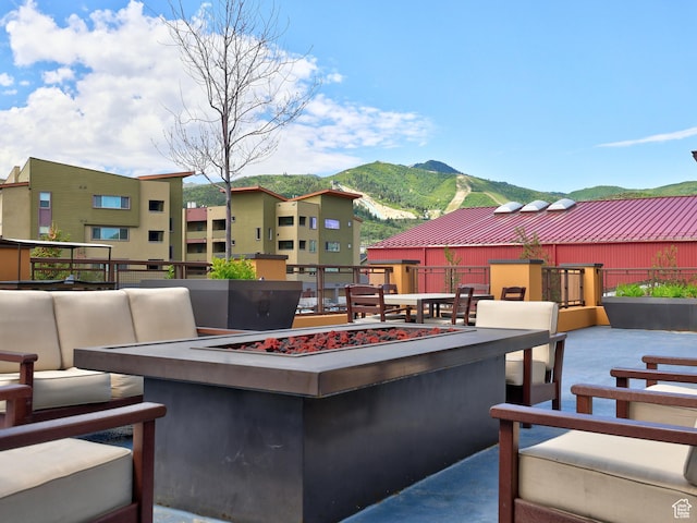 6169 E Park Ln S Unit 30, Park City, UT 84098 - view of patio / terrace featuring a mountain view and an outdoor living space with a fire pit