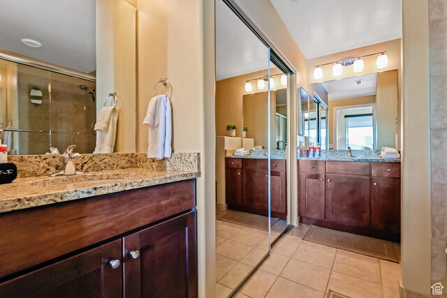 6169 E Park Ln S Unit 30, Park City, UT 84098 - bathroom with two vanities, tile patterned floors, and a shower stall