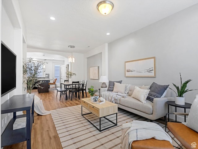 4851 W Daybreak Pkwy, South Jordan, UT 84009 - living area featuring a chandelier, wood finished floors, and recessed lighting