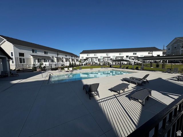 949 W Big Ben Ln Unit I304, Saratoga Springs, UT 84045 - community pool featuring a patio area and a residential view