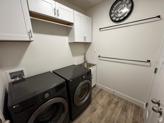 949 W Big Ben Ln Unit I304, Saratoga Springs, UT 84045 - washroom with independent washer and dryer, wood finished floors, and cabinet space