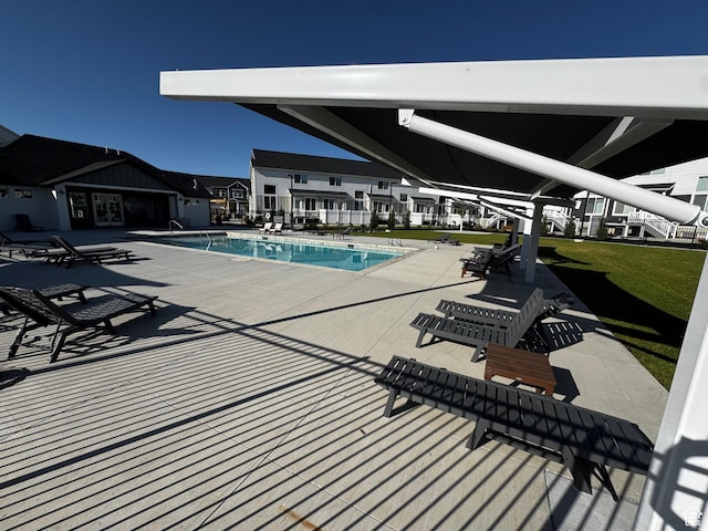 949 W Big Ben Ln Unit I304, Saratoga Springs, UT 84045 - community pool featuring a patio area and a lawn