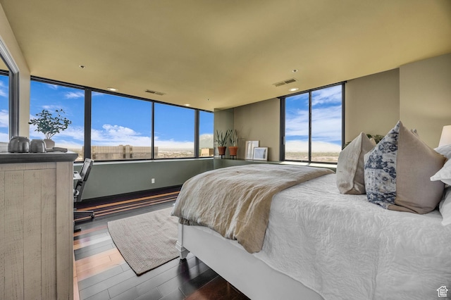 44 W Broadway S Unit 2005S, Salt Lake City, UT 84101 - bedroom featuring wood finished floors