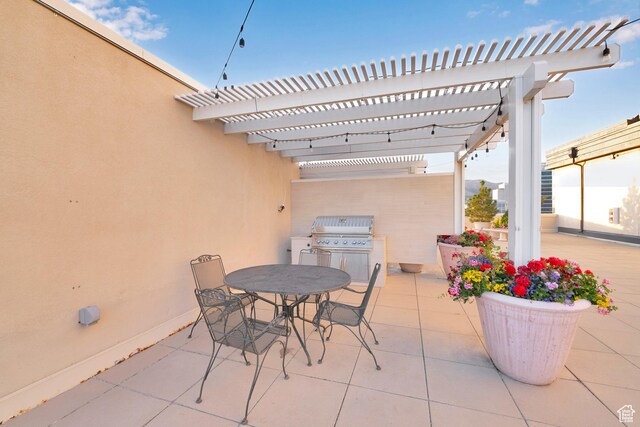 44 W Broadway S Unit 2005S, Salt Lake City, UT 84101 - view of patio featuring a pergola, outdoor dining space, and an outdoor kitchen