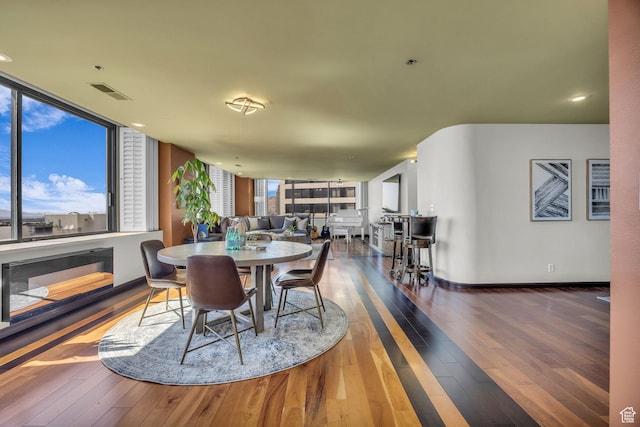 44 W Broadway S Unit 2005S, Salt Lake City, UT 84101 - dining space with hardwood / wood-style flooring and plenty of natural light